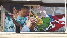 'Frontline Heroes:' Milwaukee muralist completes homage to medical workers on city's south side