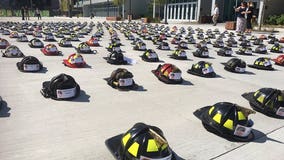 343 helmets outside Fiserv Forum honor firefighters lost on 9/11