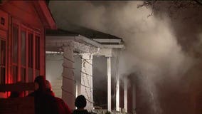 Firefighters battle two-alarm house fire near 29th & Grant