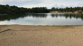 Father and son pull man from water at Quarry Lake Park in Mount Pleasant: "Praying he makes it"