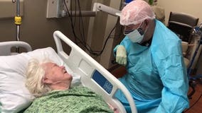 After months apart, 90-year-old Florida man wears full PPE to say goodbye to wife with dementia