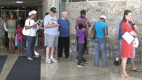 Voters line up on Memorial Day to cast absentee ballots