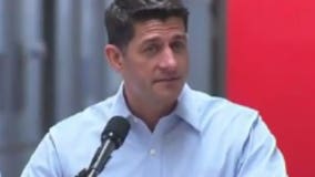 Speaker Ryan pitches tax reform at shoe factory as protesters gather