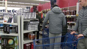 Marquette University basketball players shop for Christmas gifts; donate them to Milwaukee Rescue Mission