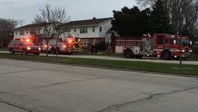 Red Cross assisting two adults, child after fire near 61st and Florist