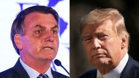 Brazilian who met President Trump has virus; no plans to test president