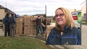 Just in time for Thanksgiving, volunteers fill holiday food boxes for 500 local families