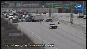 Crews called in to clear gravel from I-43/94 at Plainfield Ave.; semi stopped to block traffic