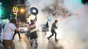 Mugged, smacked and threatened: A photographer's night in Ferguson, MO