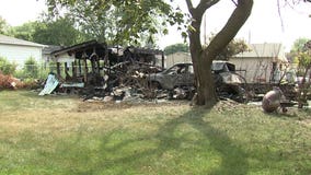 Retired firefighters spot garage fire on Milwaukee's south side, jump into action