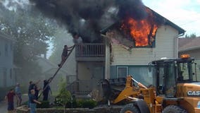 Neighbors race to save man from burning building in Racine