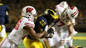 No. 15 Wisconsin falls 38-13 to No. 12 Michigan