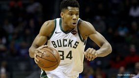 Giannis Antetokounmpo scores 36 points, Bucks hold off Bulls 116-113