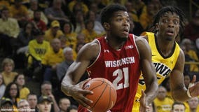 Trice, No. 22 Wisconsin win at No. 14 Iowa 72-66