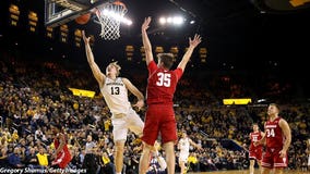 No. 7 Michigan outlasts No. 19 Wisconsin 61-52