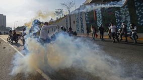 Street clashes erupt as Venezuela's Guaido urges uprising