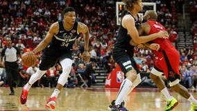 Bucks beat Rockets 117-111 in season opener