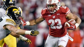 Jonathan Taylor helps No. 16 Wisconsin outlast No. 18 Iowa 24-22