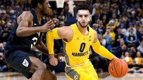 Howard's 17 points lead Marquette past No. 19 Butler, 76-57