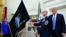 Space Force unveils flag; President Trump touts 'super-duper missile'