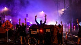 Thousands ignore Minneapolis curfew as U.S. protests spread