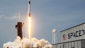 SpaceX's astronaut-riding Dragon arrives at space station