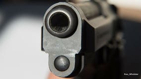 Man kills suspected robber with gun he had in vehicle