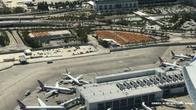 Police shoot armed man at Miami airport amid Irma evacuation