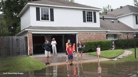 Floodwaters drop across much of Houston; danger not over