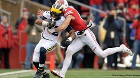 No. 5 Wisconsin wins slugfest against No. 19 Michigan 24-10