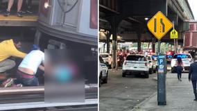 Video shows girl rescued after father allegedly held her, jumped in front of subway car