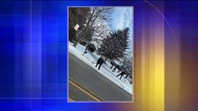 'Happy to step in:' Greenfield police officer praised for helping elderly woman shovel her driveway