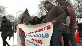 "We're going to be doing this until he listens:" Protesting proposed cuts, group rallies near Walker's home