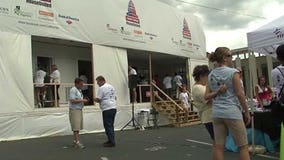 Democratic delegates work to build home with Habitat for Humanity