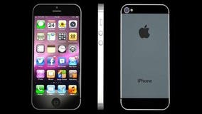 Apple CEO Tim Cook's pay slumps along with iPhone sales