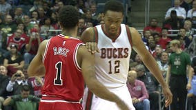 They went to the same high school! Jabari Parker, Derrick Rose face each other on the basketball court