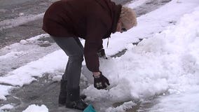 'Hard as a rock:' Heavy, wet spring snow and ice difficult to clean up across Milwaukee