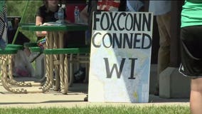 'Losing their land:' Protesters march in Mount Pleasant during Pres. Trump's speech at Foxconn