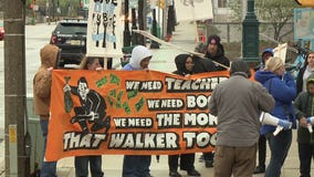 Milwaukee teachers' union members clash with Gov. Walker supporters outside MPM