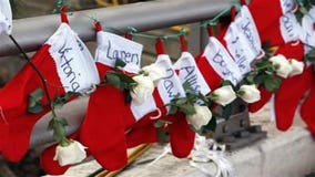 Newtown observes Christmas amid signs of mourning