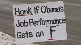 Supporters, protesters greet Pres. Obama outside GE plant