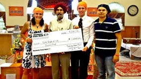 "Ordinary Heroes" presents donations to Sikh Temple of Wis.