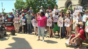 "Our children are not for sale:" Parents, teachers rally against turnaround plan for public schools