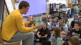 UWM Panthers read to students ahead of the Big Dance