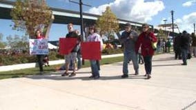 Supporters and protesters show up at Obama rally