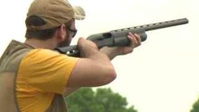 Marquette High School's Patrick Bassi shoots trap