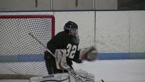 Hitting the books by day, blocking pucks by night