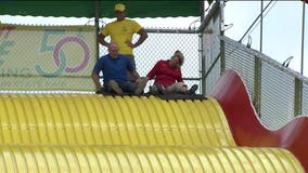 Live exhibit and food: Brian Kramp roams the grounds of the Wisconsin State Fair