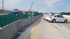 Sheriff: Dump truck driver changed lanes, striking sedan, sending it into median barrier on I-41/94