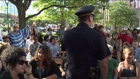 Tension between police, protesters at Red Arrow Park: "They don't want us to take to the street"